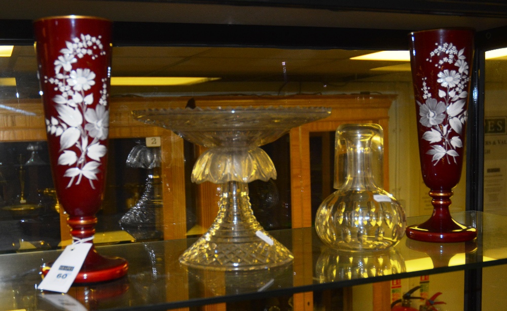 A pair of Cranberry glass vases, decorated with flowers, including a cut glass tassa and  water