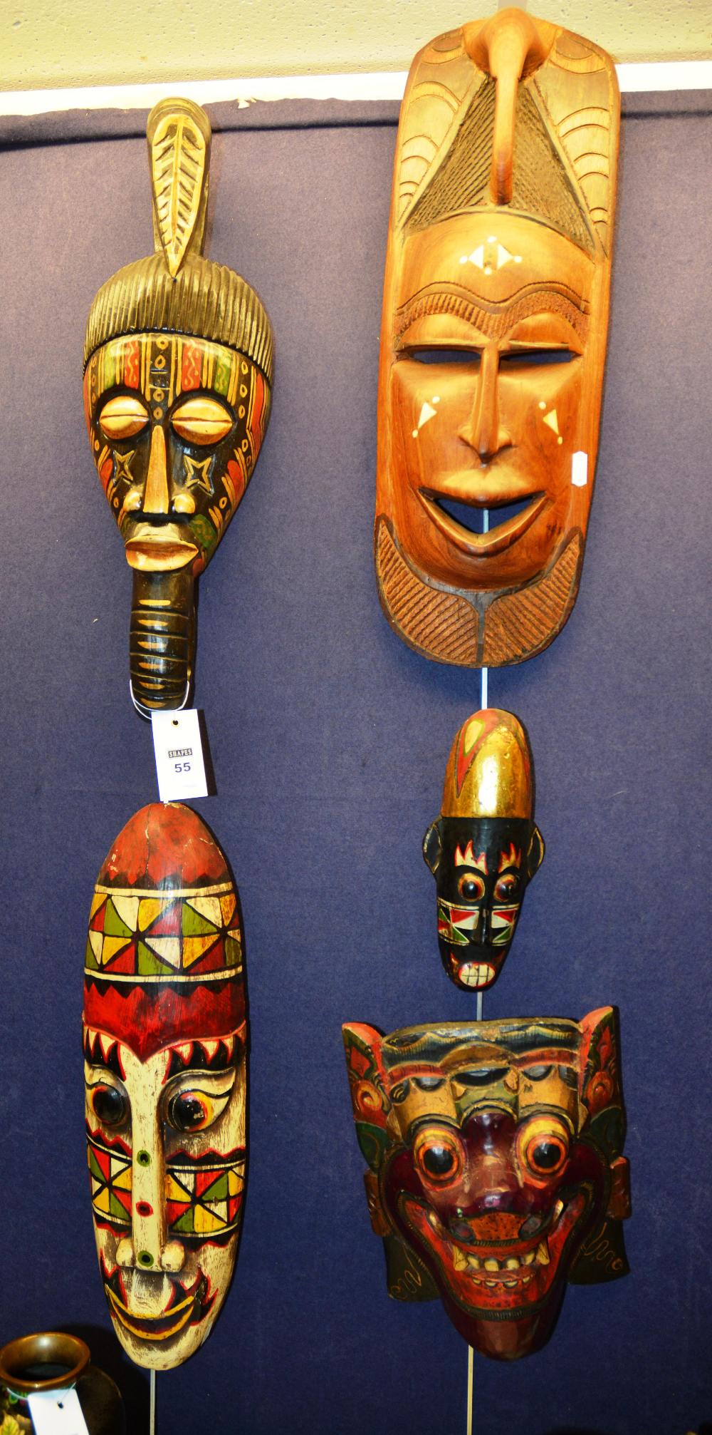 Five various carved and painted tribal masks (5)