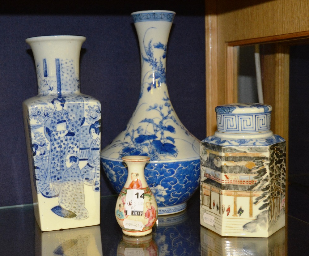 A collection of Oriental ceramics, including two blue and white vases, one jar and cover and one