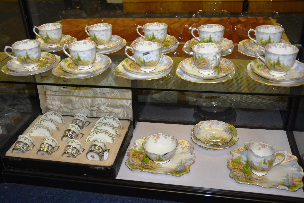 A boxed set of six George Jones Crescent China coffee cups and saucers, together with a set of Royal