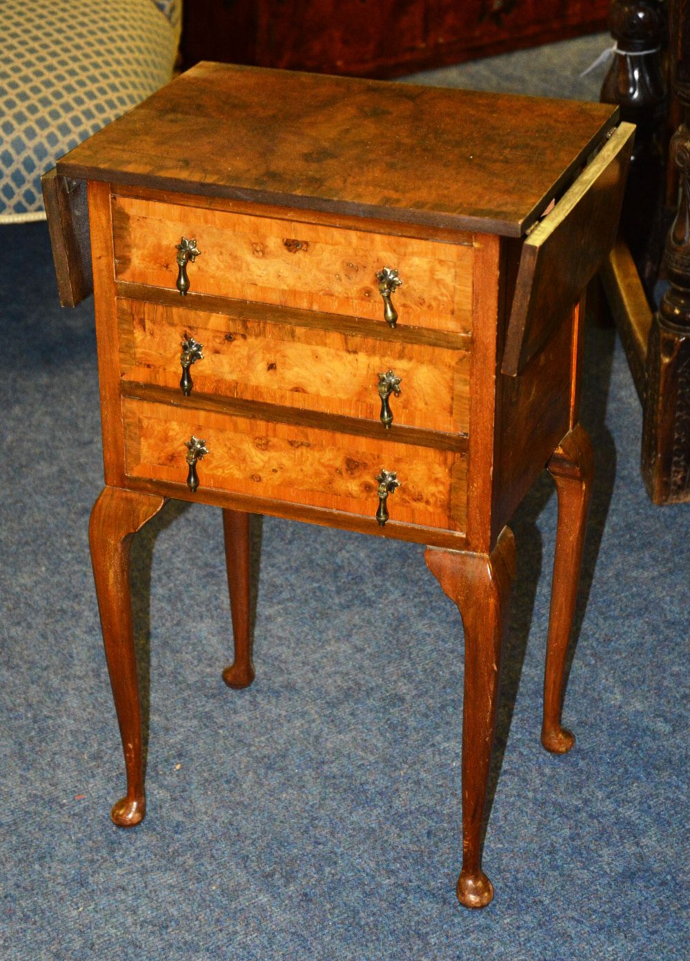 A Queen Anne style burr walnut side chest, the rectangular drop flop top over three cross banded