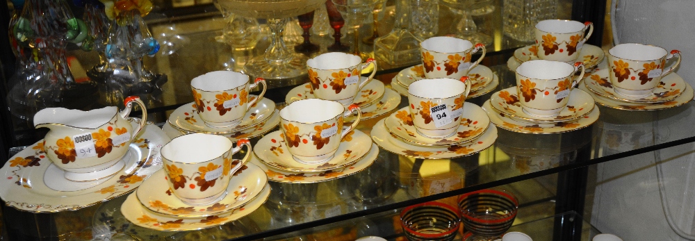 An Art Deco part teaset, with hand painted floral detail by Paragon, England, no.744170,