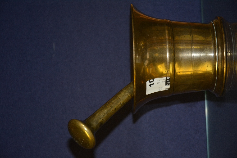 A 17th century brass mortar and pestle (2)