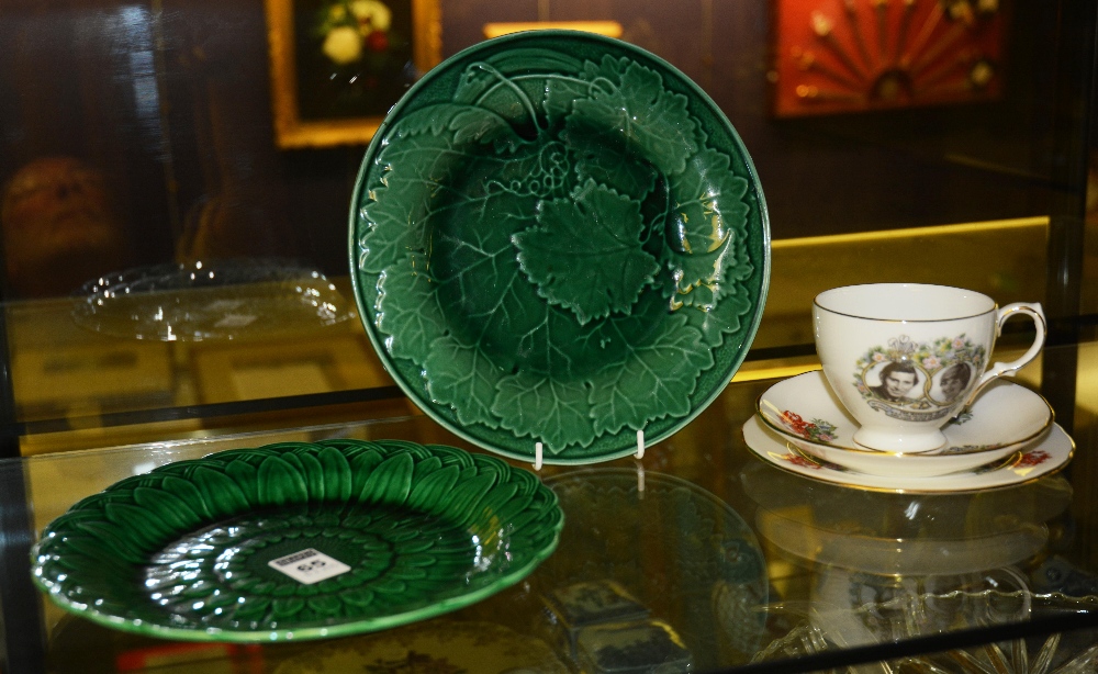 Two Wedgwood Green cabbage plates, 21.5cm diameter, together with a commemorative Lady Diana trio