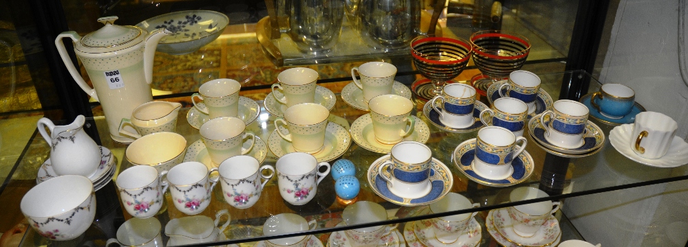 A mixed collection of coffee cups and saucers, including a Crown Devon coffee set comprising