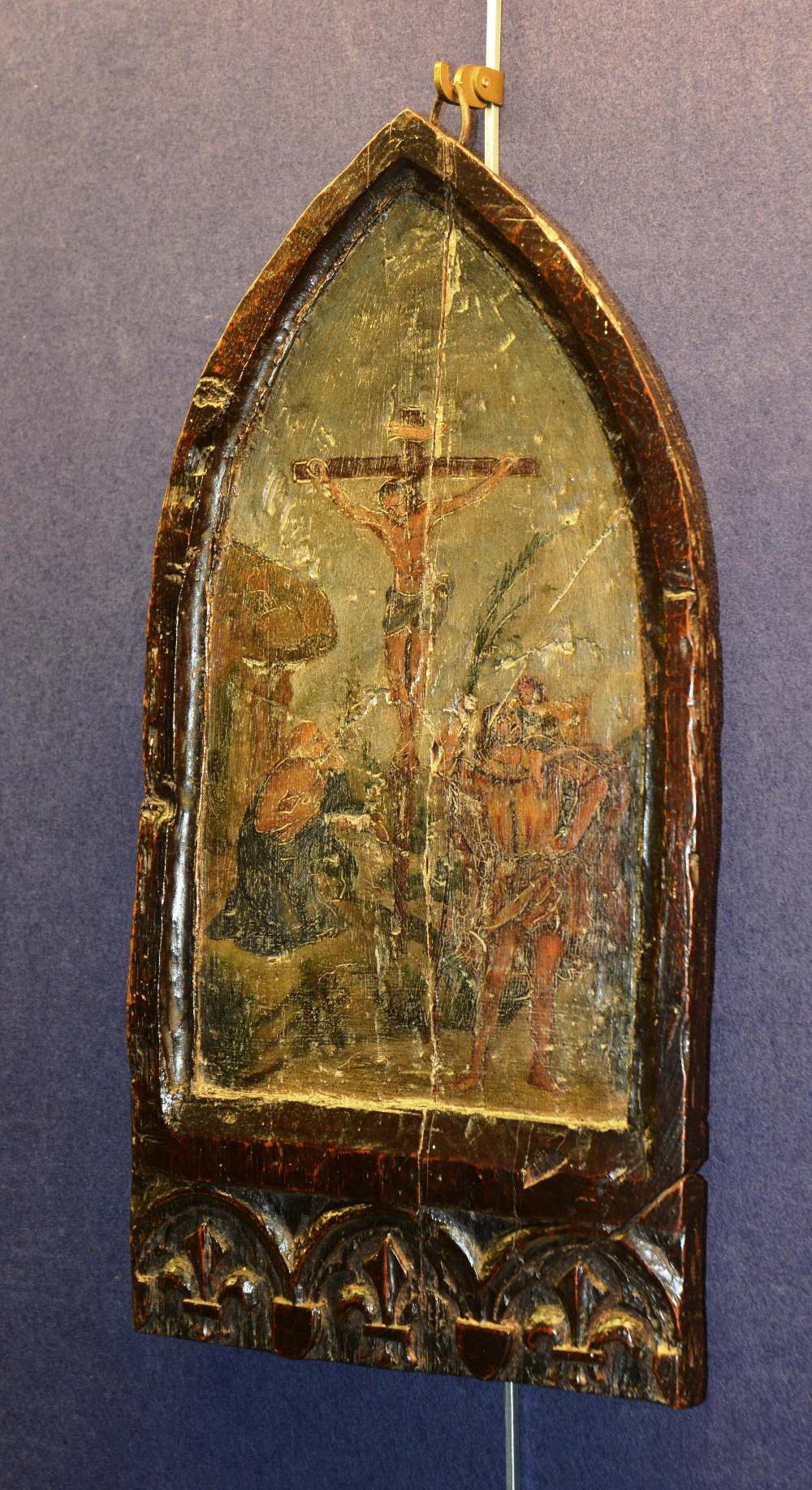 WITHDRAWN A Gothic arched icon of the crucifixion, 45cm high x 23cm wide