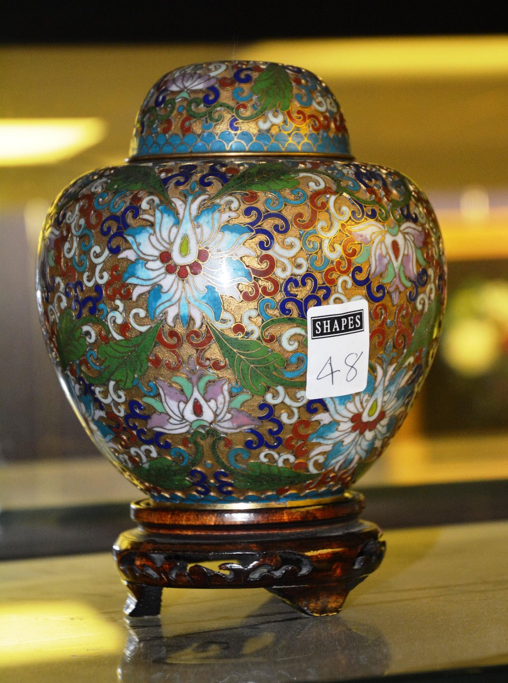 A Chinese cloisonne ginger jar and cover, with stand, 15cm high