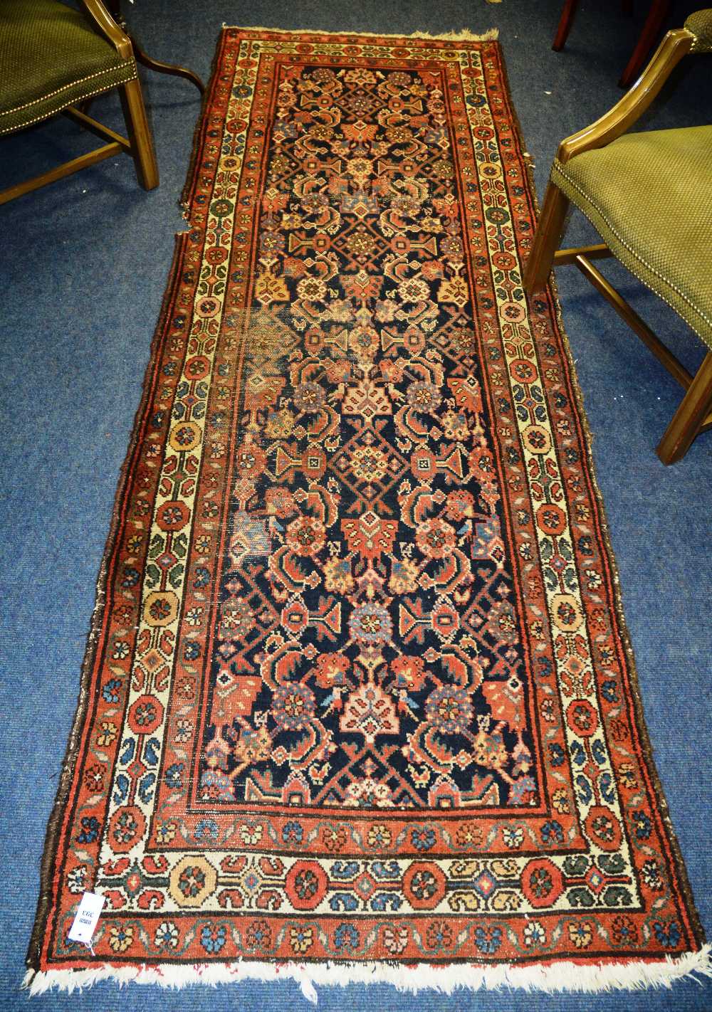 A North west Persiian runner, with allover foliate and bird pattern on blue ground and triple