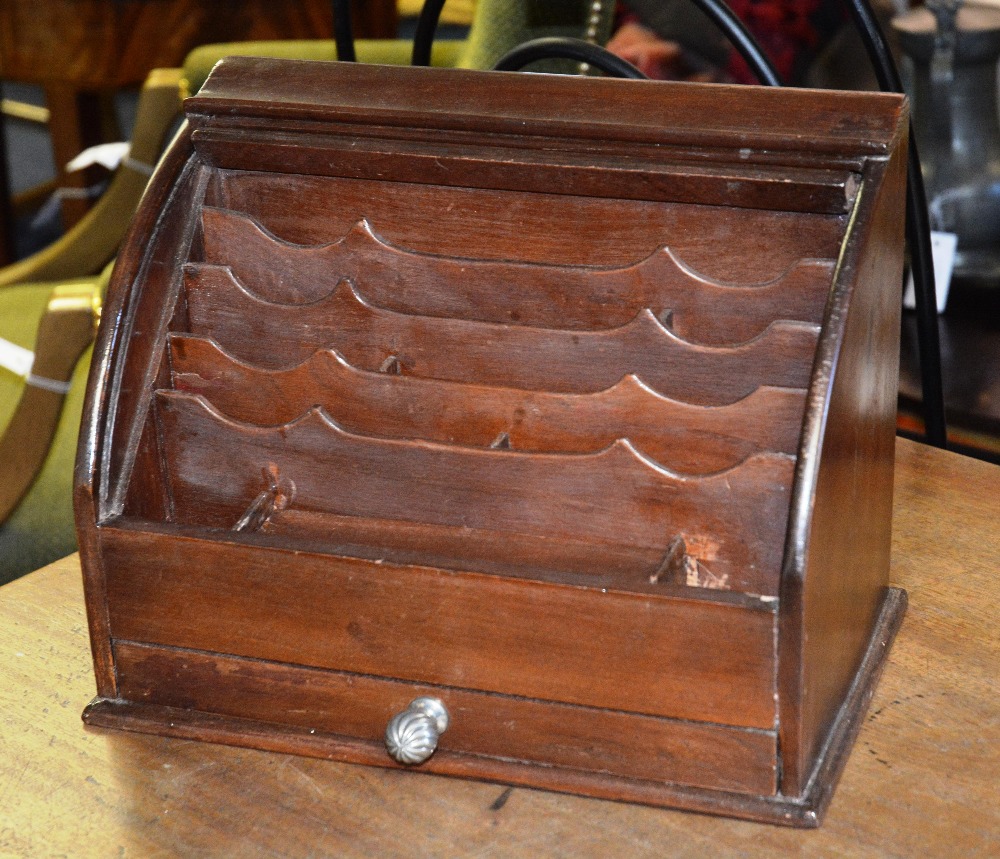 A tambour fronted writing box, the arched front enclosing letter slats over frieze drawer, 35cm wide