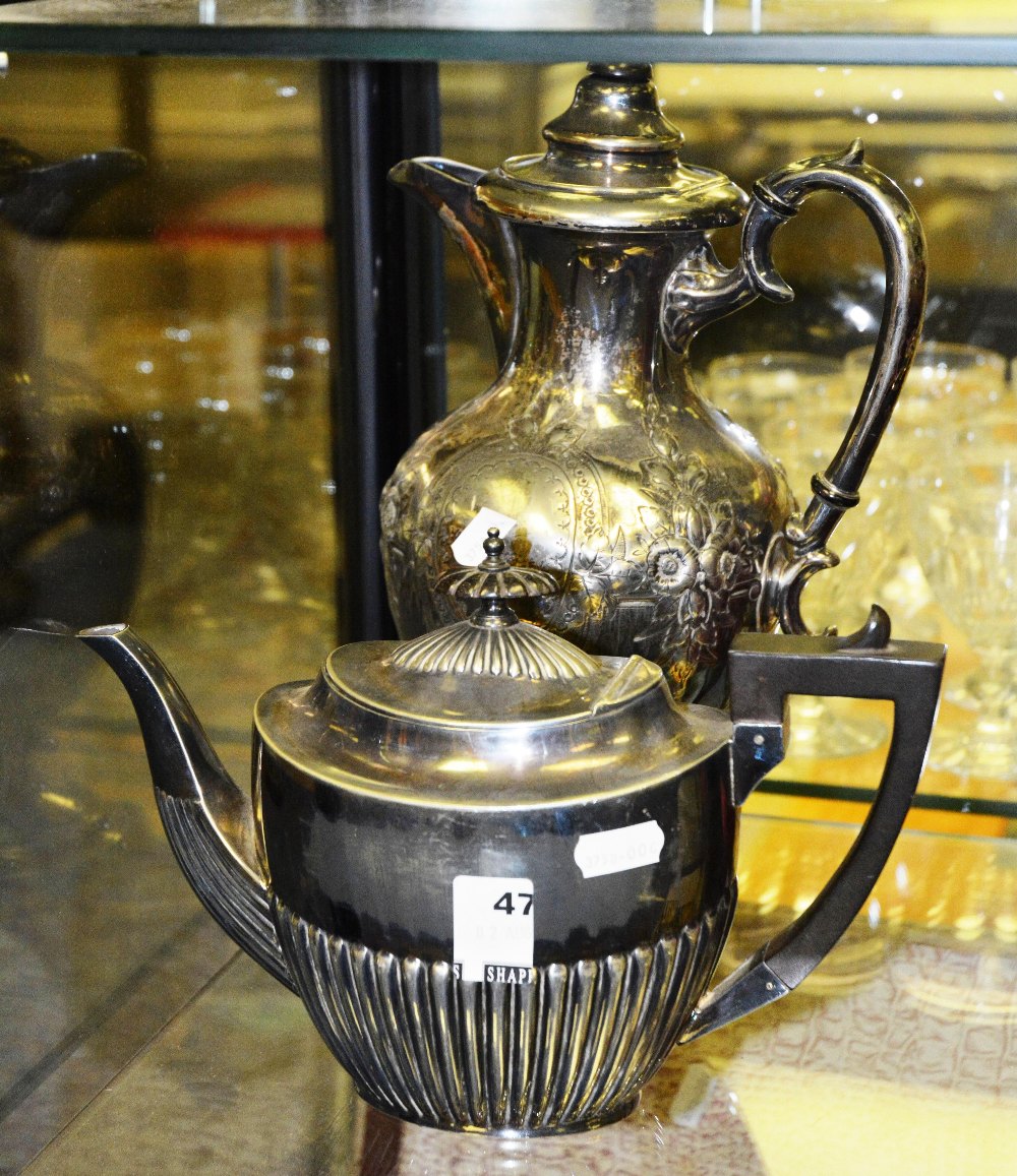 A Walker & Hall plated teapot, and a Taunton & Johnston plated coffee pot, 36cm high (2)