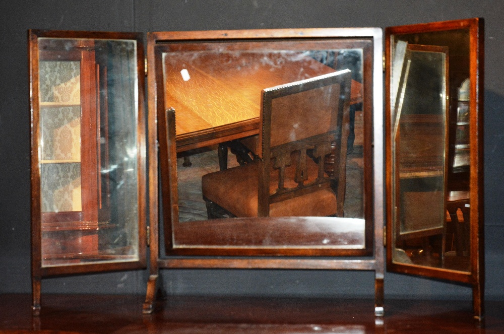 A mahogany tryptic dressing mirror, 115cm wide x 68cm high