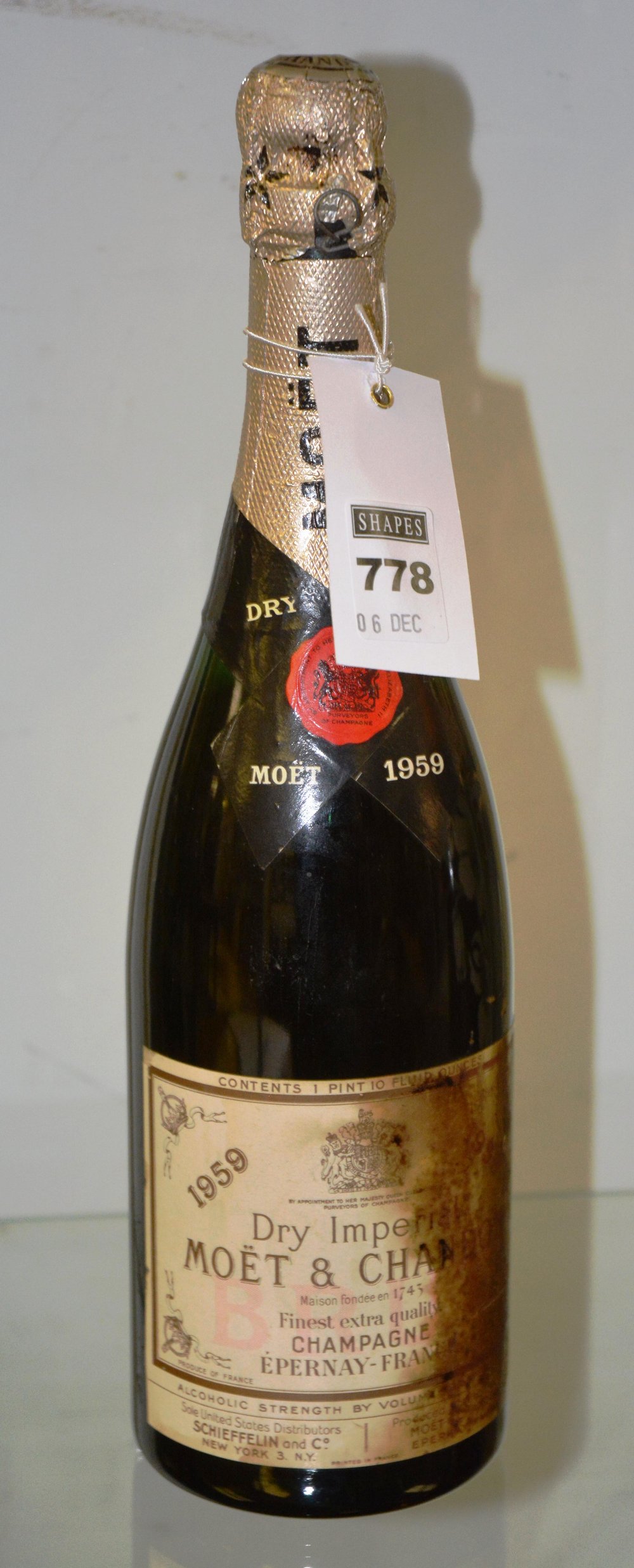 A bottle of Moet & Chandon Dry Imperial Champagne 1959