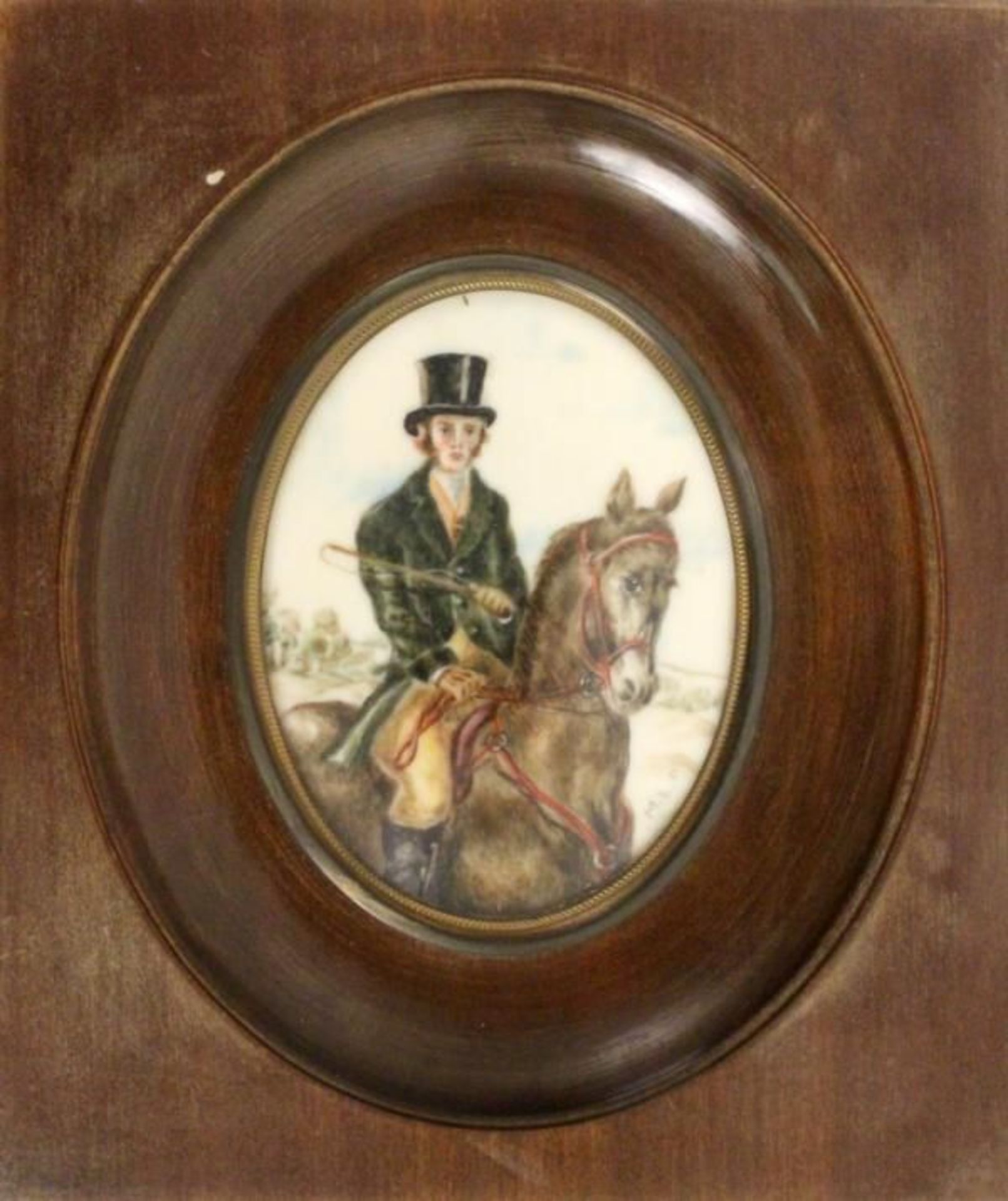 A MINIATURE An elegant rider, colourful painted on ivory, monogrammed: M.L.P.; oval, 8x6.5cm, with