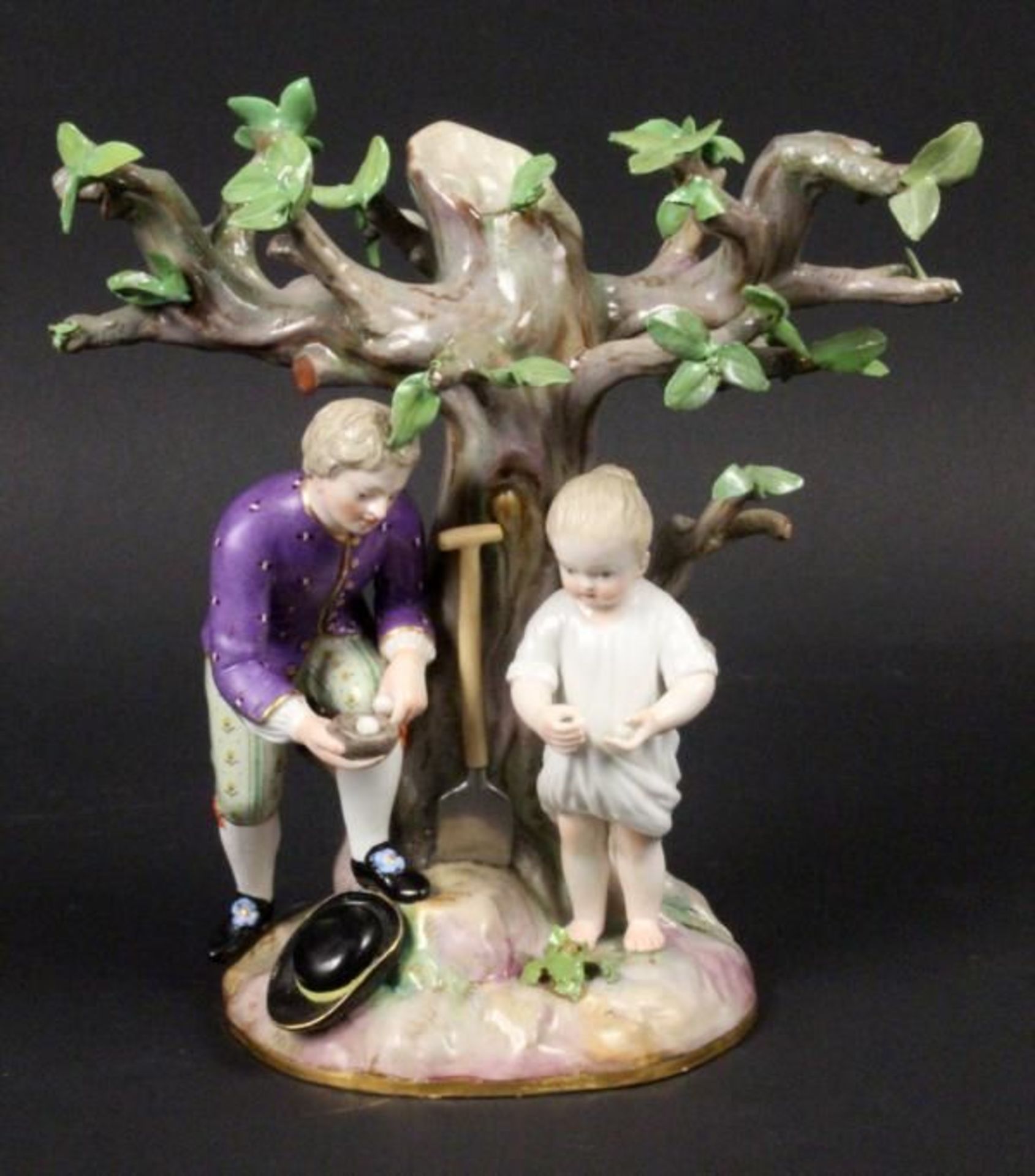 THE EGG FINDERS Meissen, 19th century A father with daughter under a tree with a bird's nest and