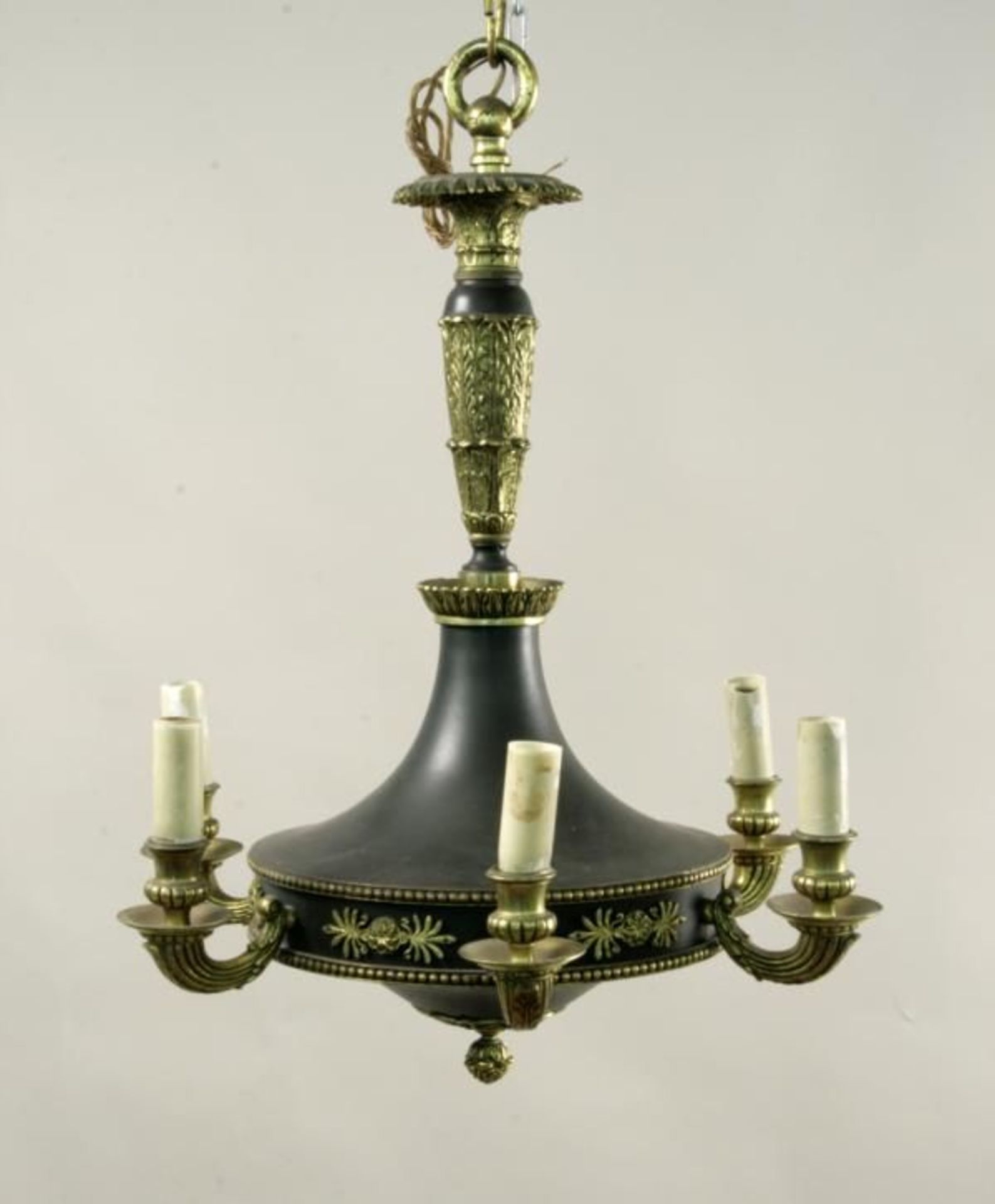 A CHANDELIER IN EMPIRE STYLE France A 6 light chandelier partially made of blackened bronze,