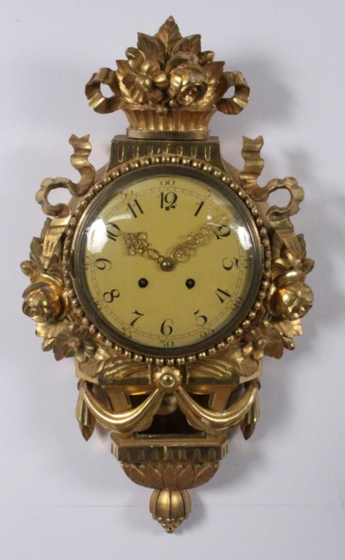 A HUGE CARTEL CLOCK Sweden Gilded case of baroque style, pendulum with striking the hours on a bell,