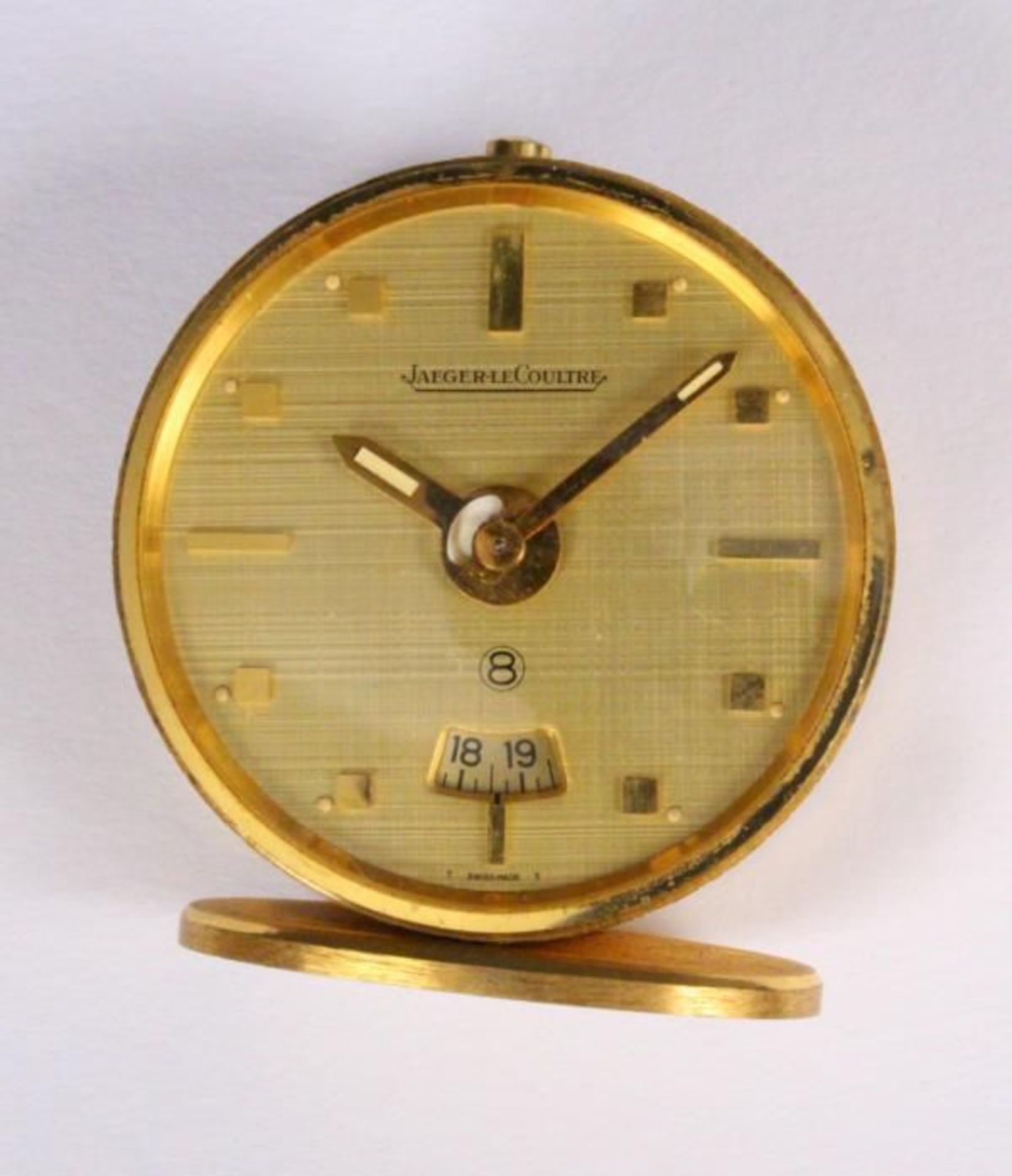 JAEGER LE COULTRE TRAVEL CLOCK Gold plated case, 8-day movement with date display, height 4.7cm,