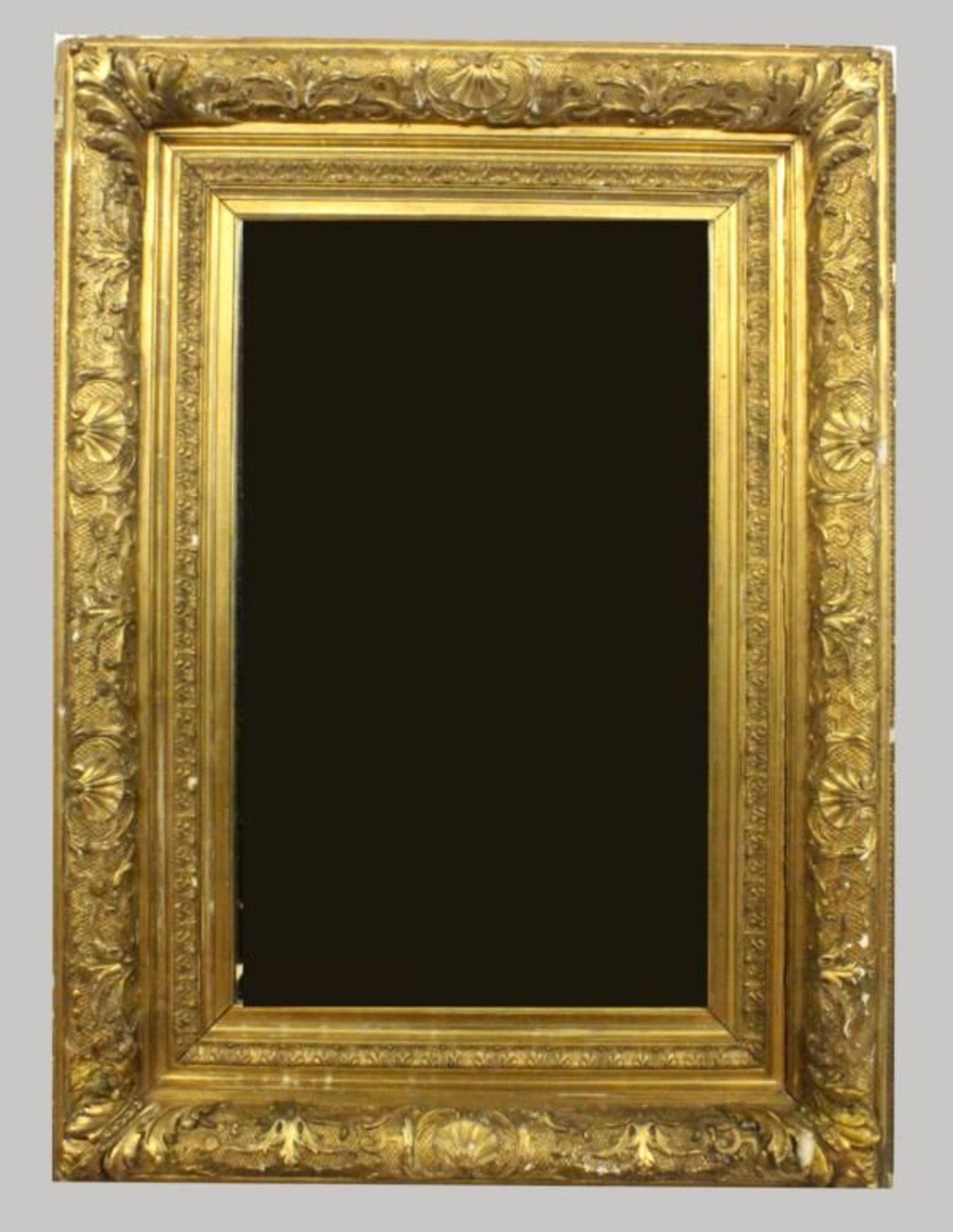 A WALL MIRROR with gilded baroque frame, 119x89cm. Condition: Damaged.    Starting price: 120