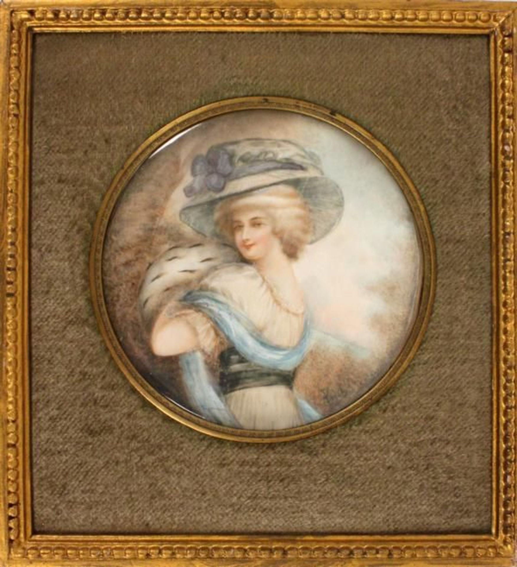 A MINIATURE of an elegant lady with hat, colourful painted on ivory, signed: Presly; diameter