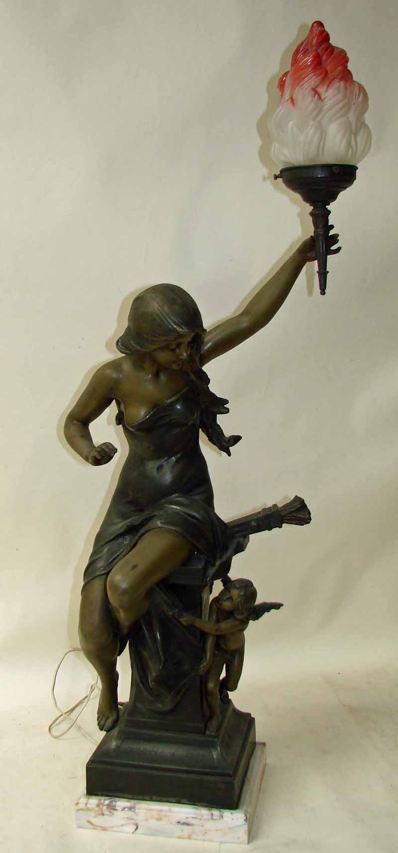 After Edouard Drouot, a figural pedestal lamp as Venus and Cupid, patinated spelter, raised on a