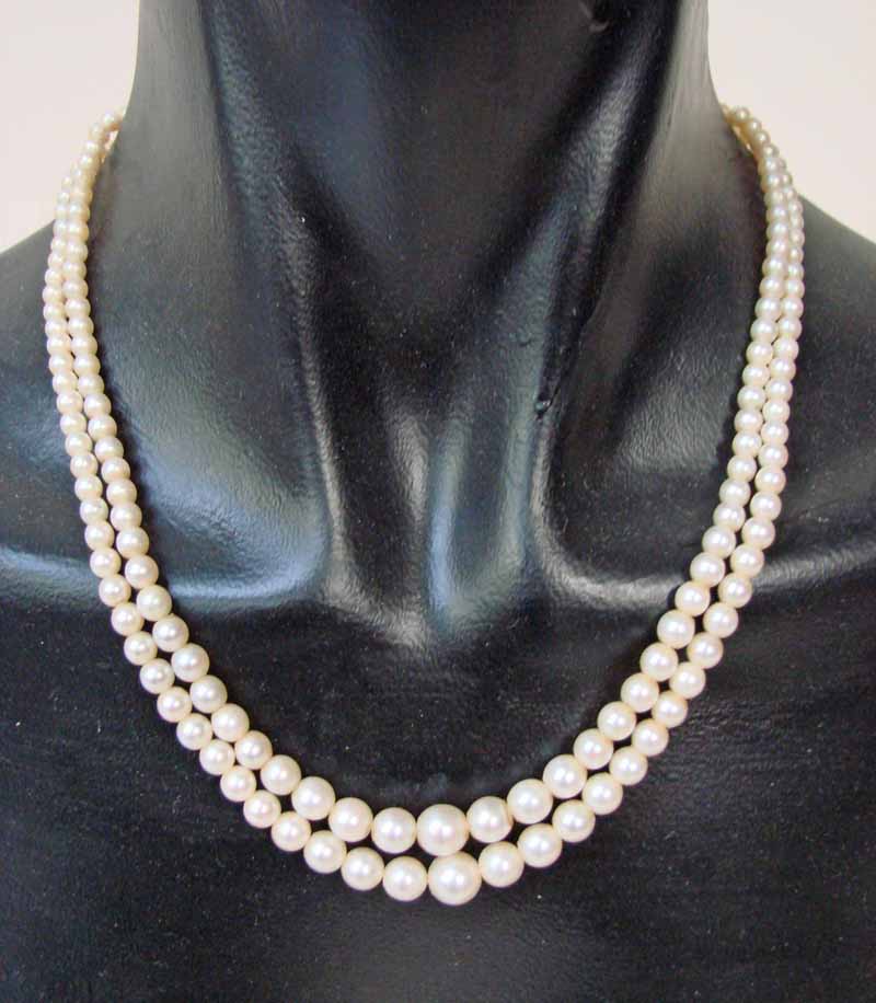 A double strand of one hundred and ninety-two Japanese Akoya cultured pearls, graduated, medium