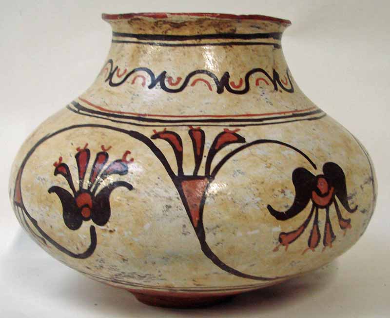 A large Pueblo pottery pot or olla, late 19th century, 26cm high. Thin body with geometric floral