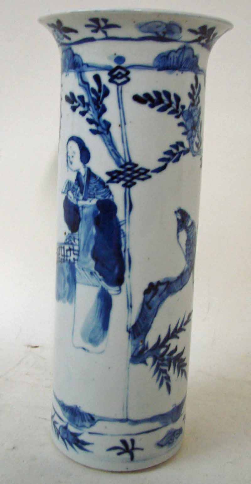 A 19th century Chinese blue and white vase of straight sided cylindrical form with everted rim,