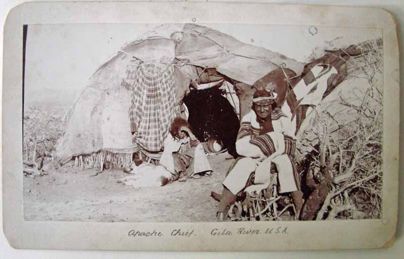 A Cabinet card photograph of an Apache chief. 133mm by 216mm plain board. Inscribed in ink on the