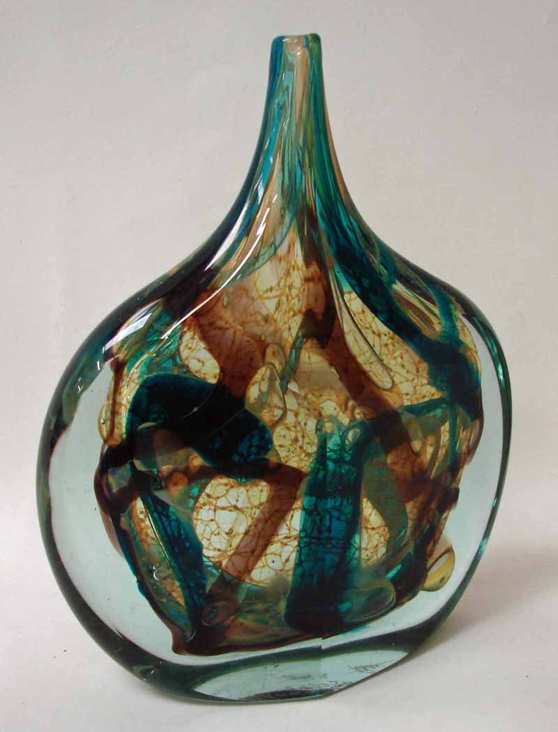 Michael Harris, Mdina Glass, a cut ice fish vase of bottle form, heavily encased with turquoise and