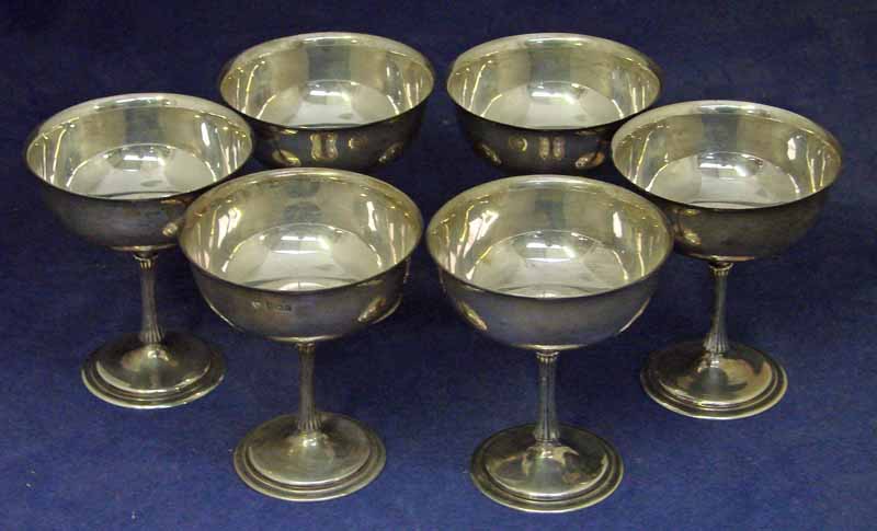 A set of six late 20th century silver grapefruit/champagne bowls by Garrard & Co of circular U