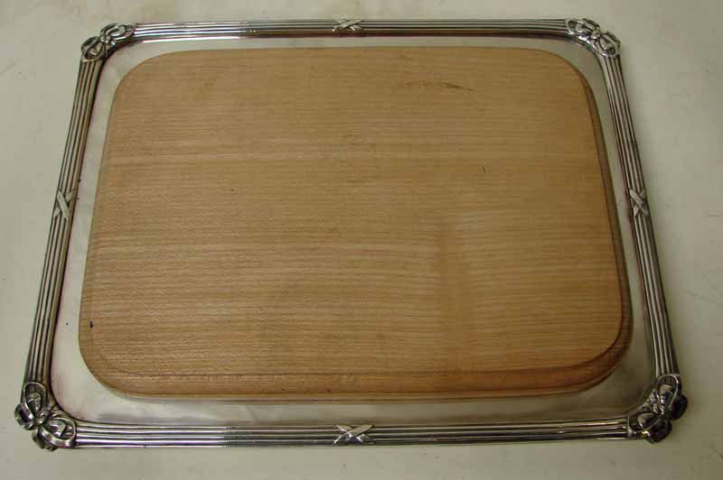 An early 20th century Daniel & Arter silver plated bread tray of rounded rectangular form with