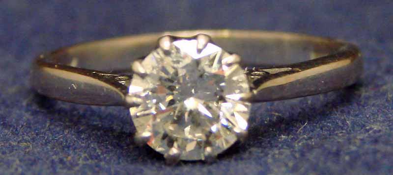 An 18ct white gold ladies diamond solitaire ring, the brilliant cut stone weighing approx 1.0