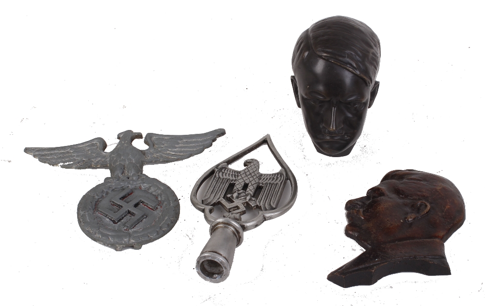 Cold painted bronze bust of Hitler; side facing bust, possibly of Stalin; cast metal Eagle over
