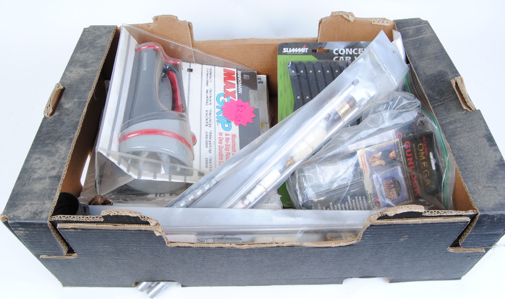 Box with torch, cleaning kits, targets, gun locks, etc.