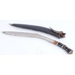 Large Indian kukri, 21,1/2 ins blade, decorated metal mounted handle in leather covered sheath