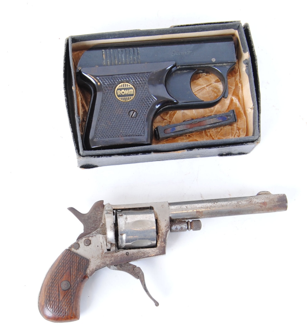 Blank firing 6 shot revolver with folding trigger and wood grips, together with Rohm RG2 starting