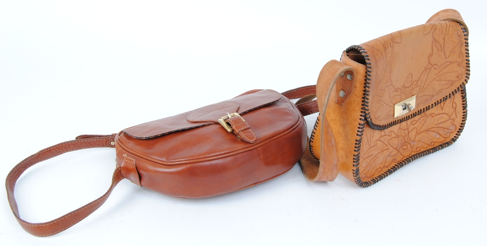 Two leather cartyridge bags