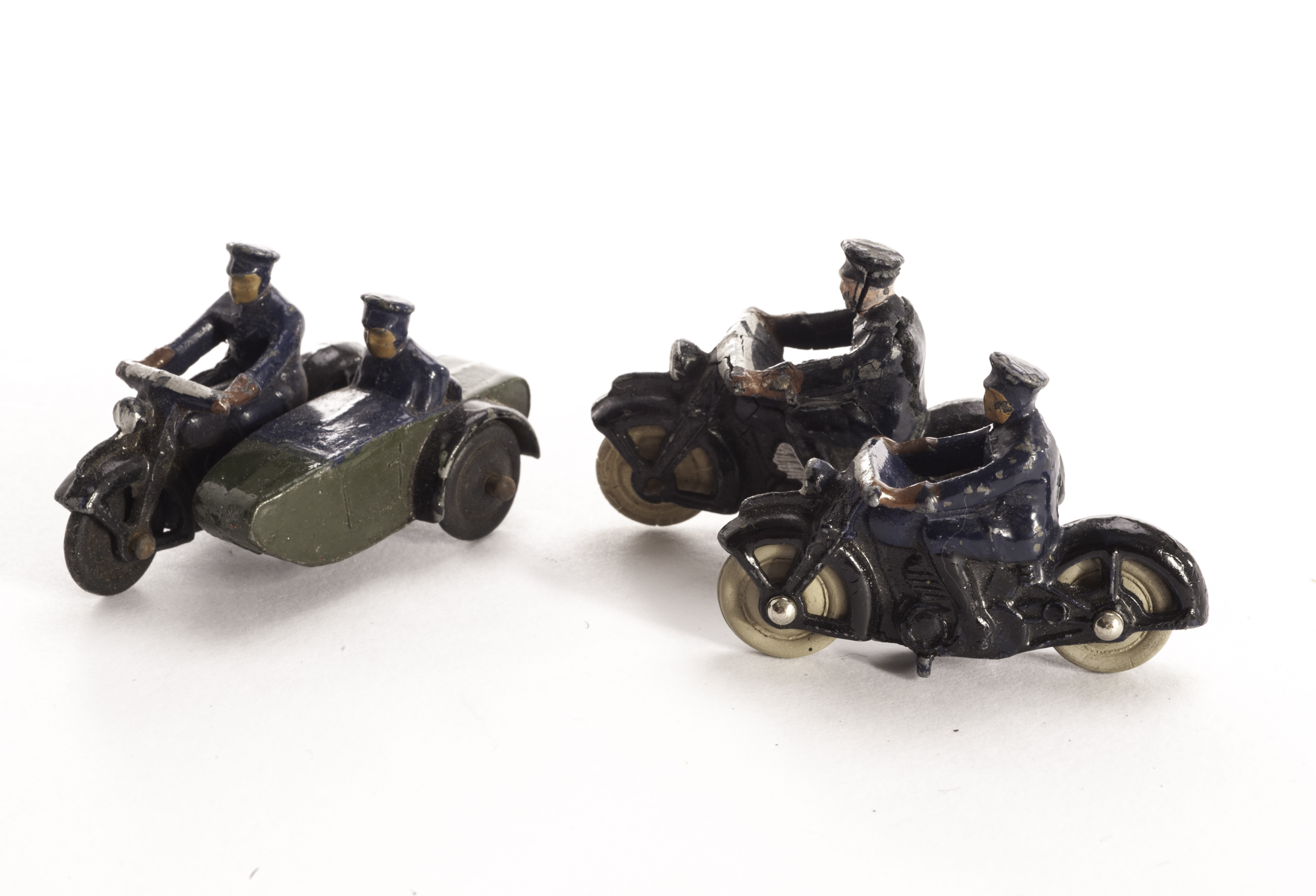 A Pre-War Dinky Toys No. 37b Police Motorcyclist, P-F, fatigue throughout, post-war example with