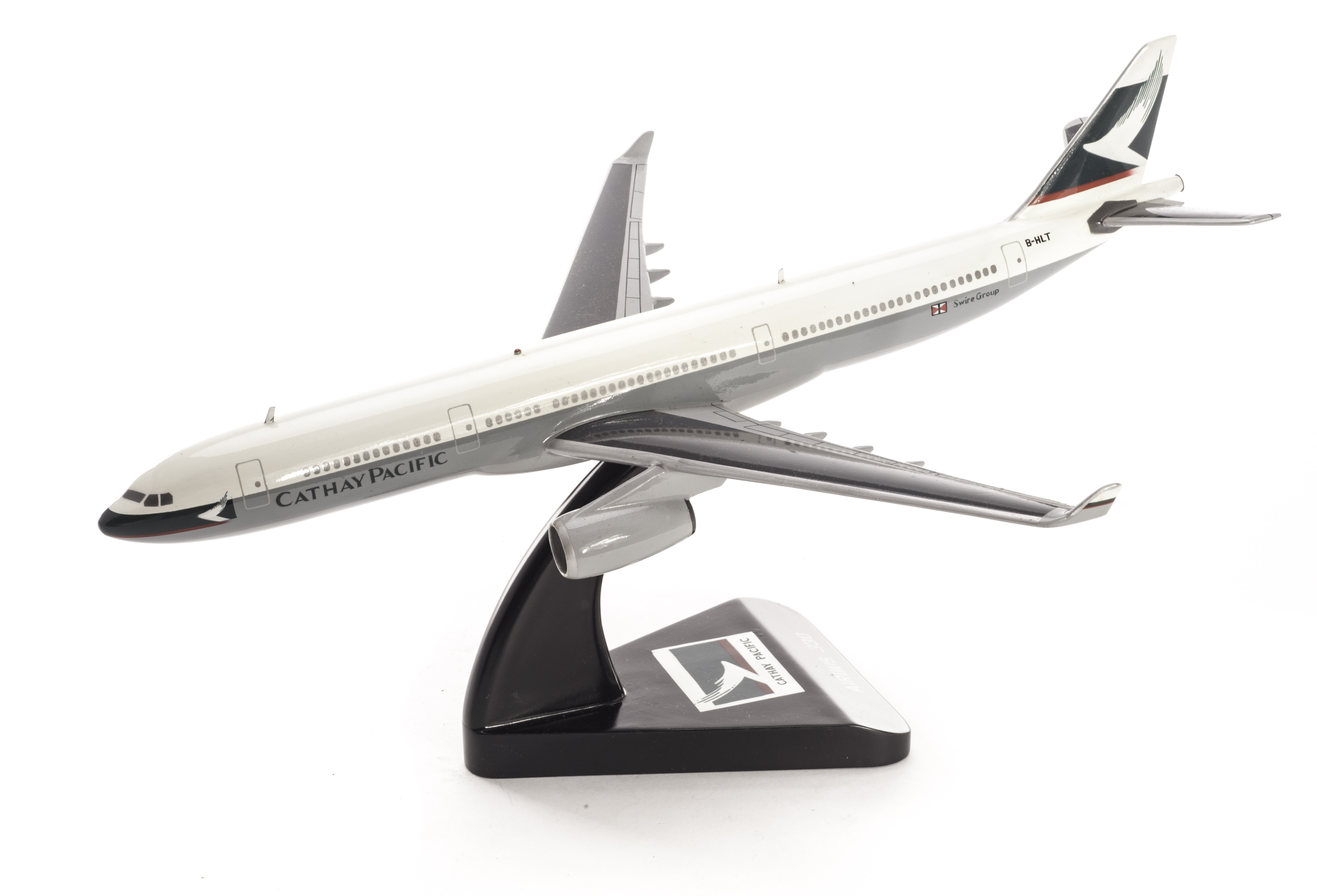 A Bravo Delta Models Airbus 330, scale model wooden aircraft, hand-finished in Cathay Pacific