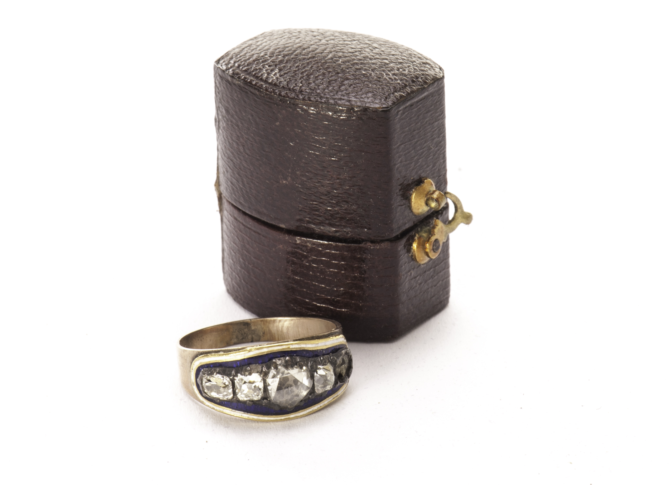 A Georgian diamond dress ring, the wide gold band with blue and white enamel tablet set with rose