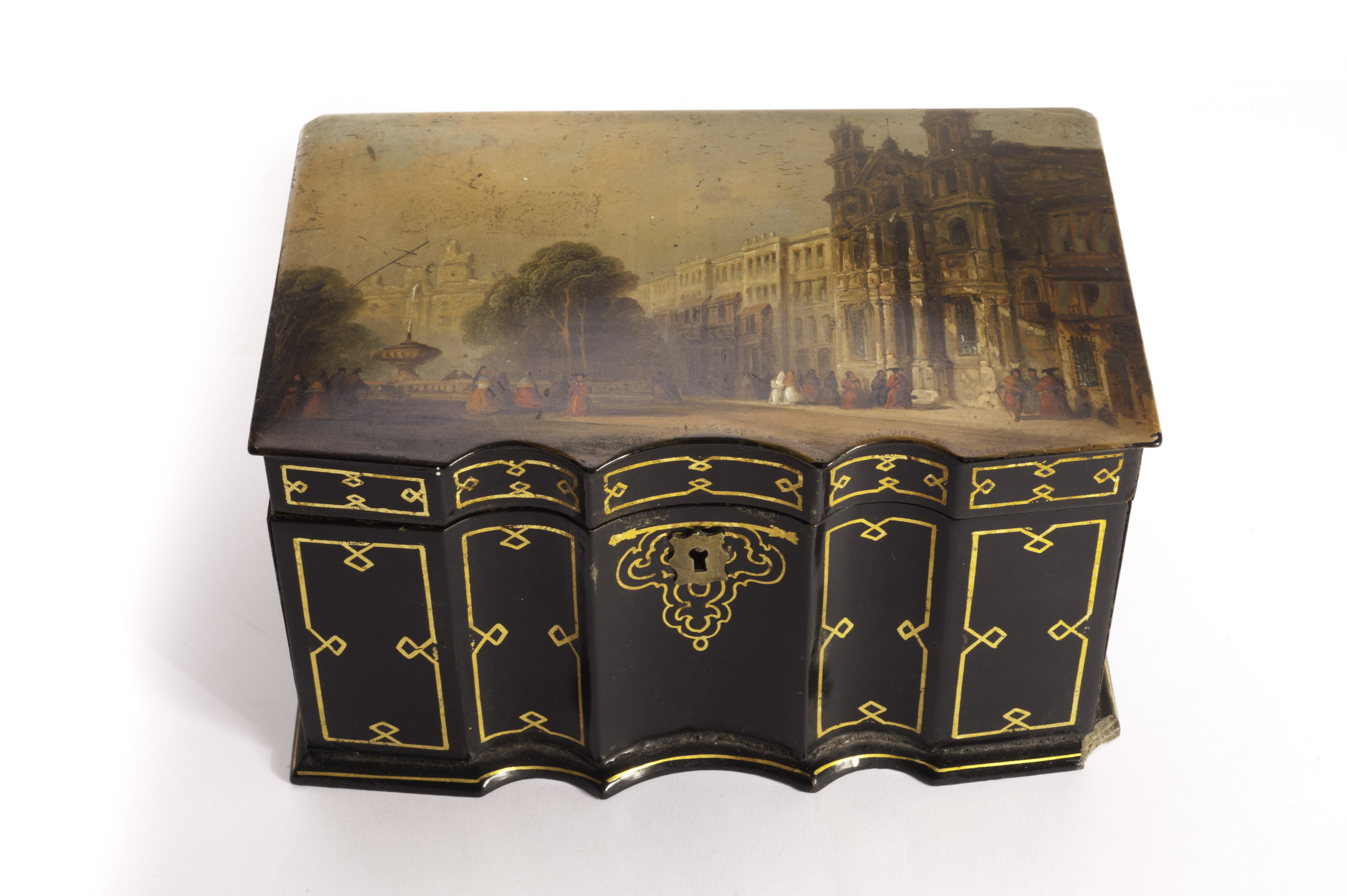 A Victorian papier-mâché tea caddy, having well painted scene of Cadiz to lid, mop knobs to lead