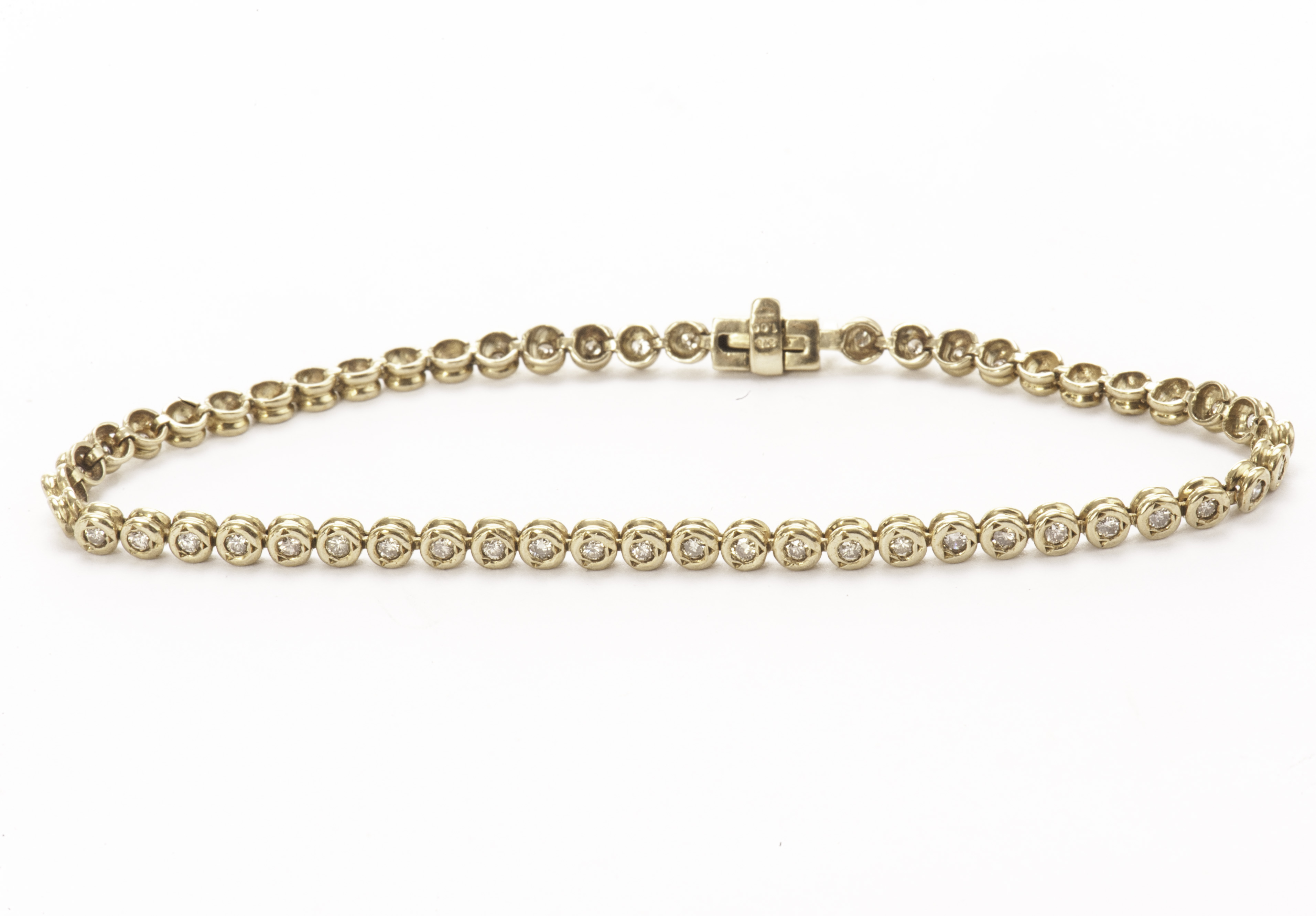 A 9ct gold and diamond tennis bracelet, the brilliant cuts in circular links, approx 1ct of