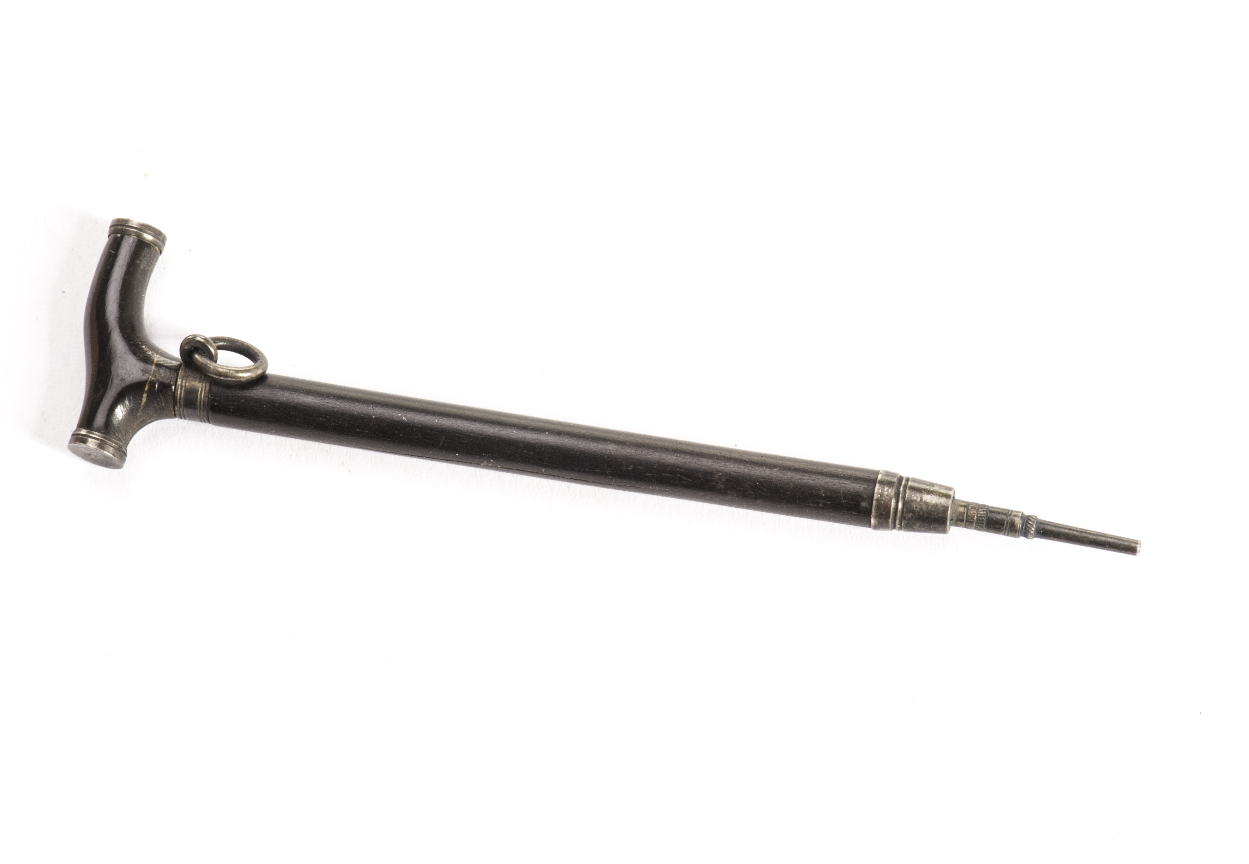 An unusual Victorian walking stick retractable pencil, the miniature cane in hardwood with white