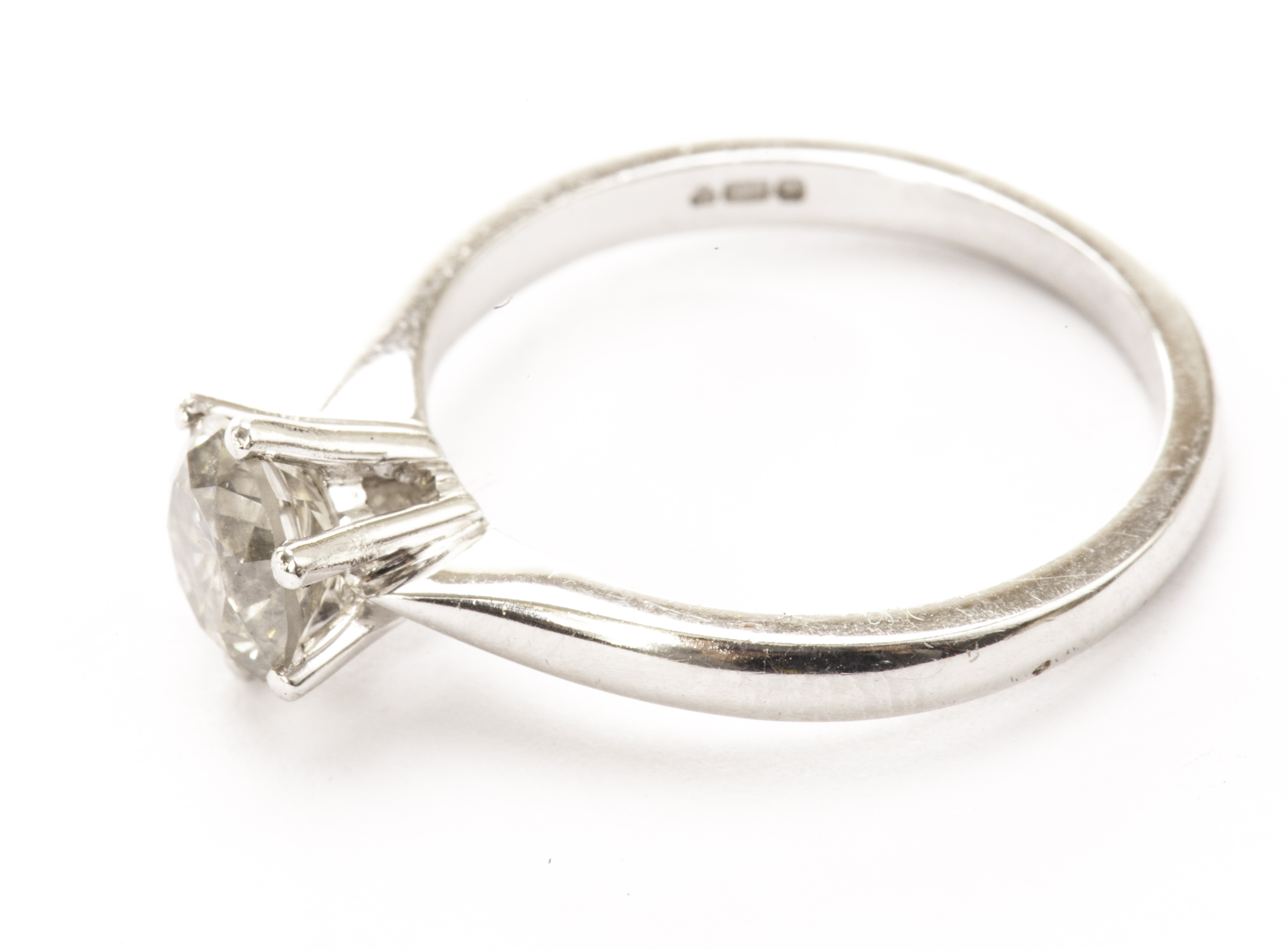 A diamond solitaire engagement ring, the approx 1ct brilliant cut in a modern 18ct white gold mount