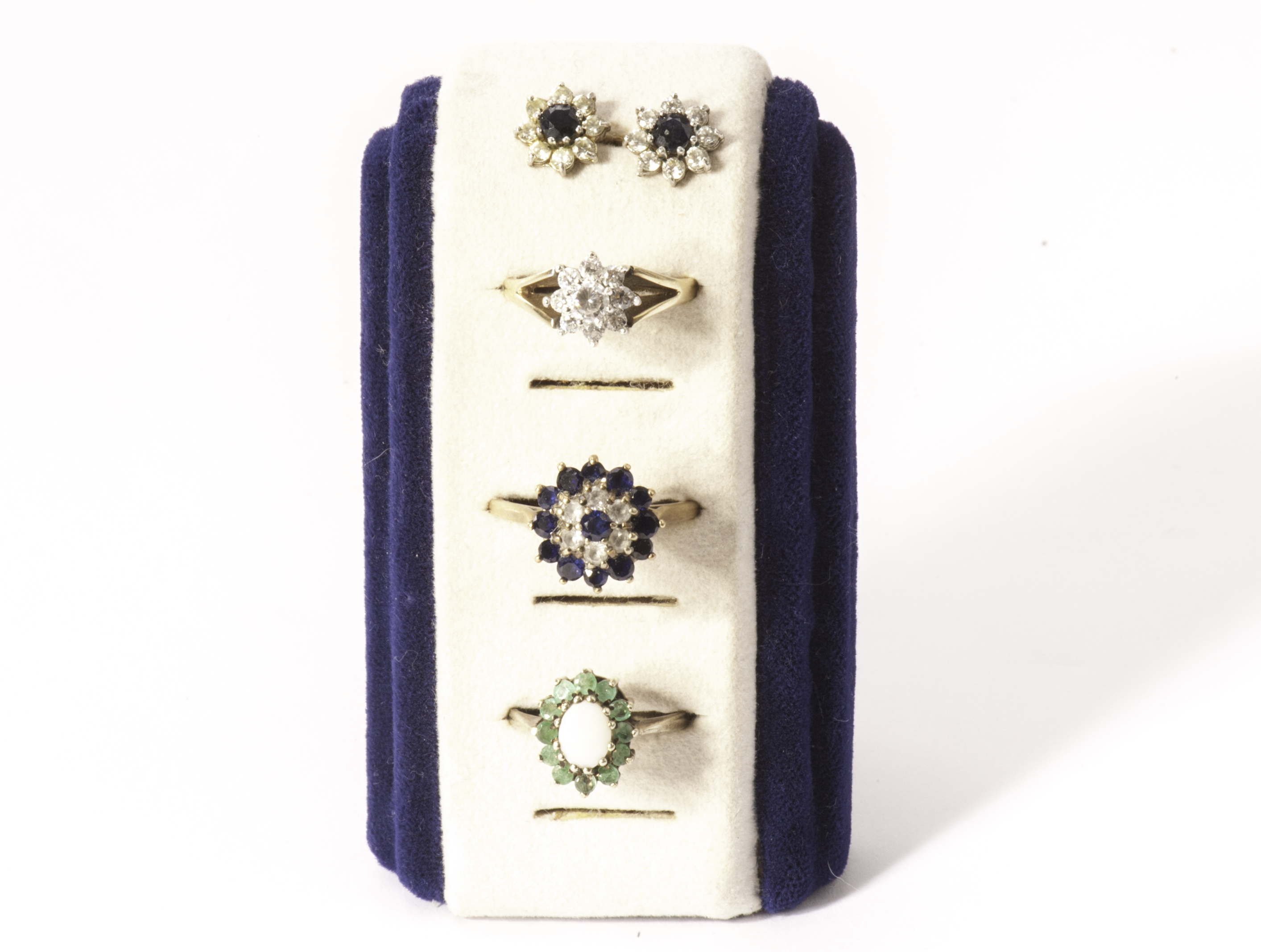 Three 9ct gold and paste set rings, including an opal cluster ring set with green stones, two