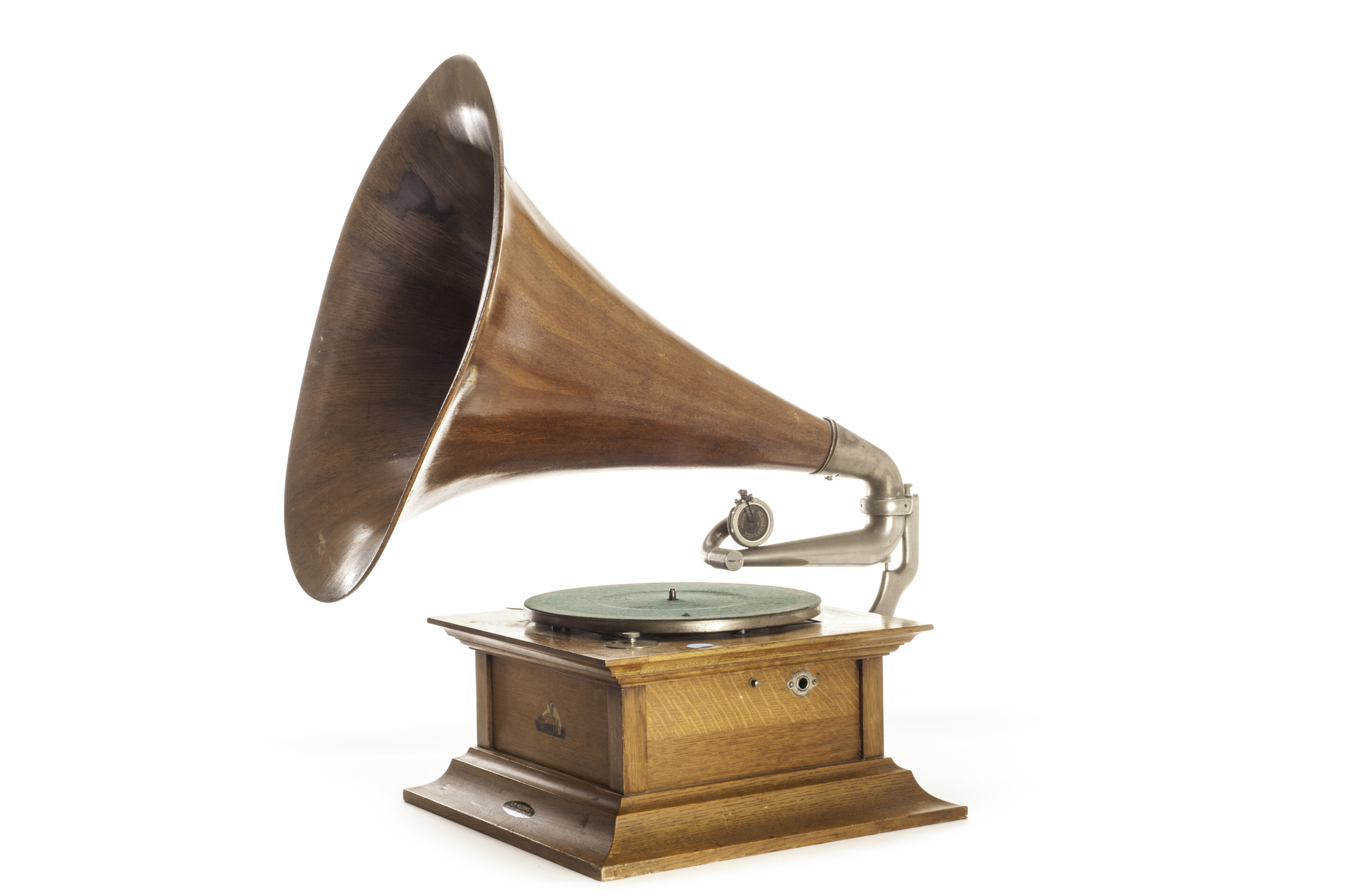 Horn gramophone: an HMV Model 7 oak gramophone with triple- spring motor, HMV Exhibition soundbox,