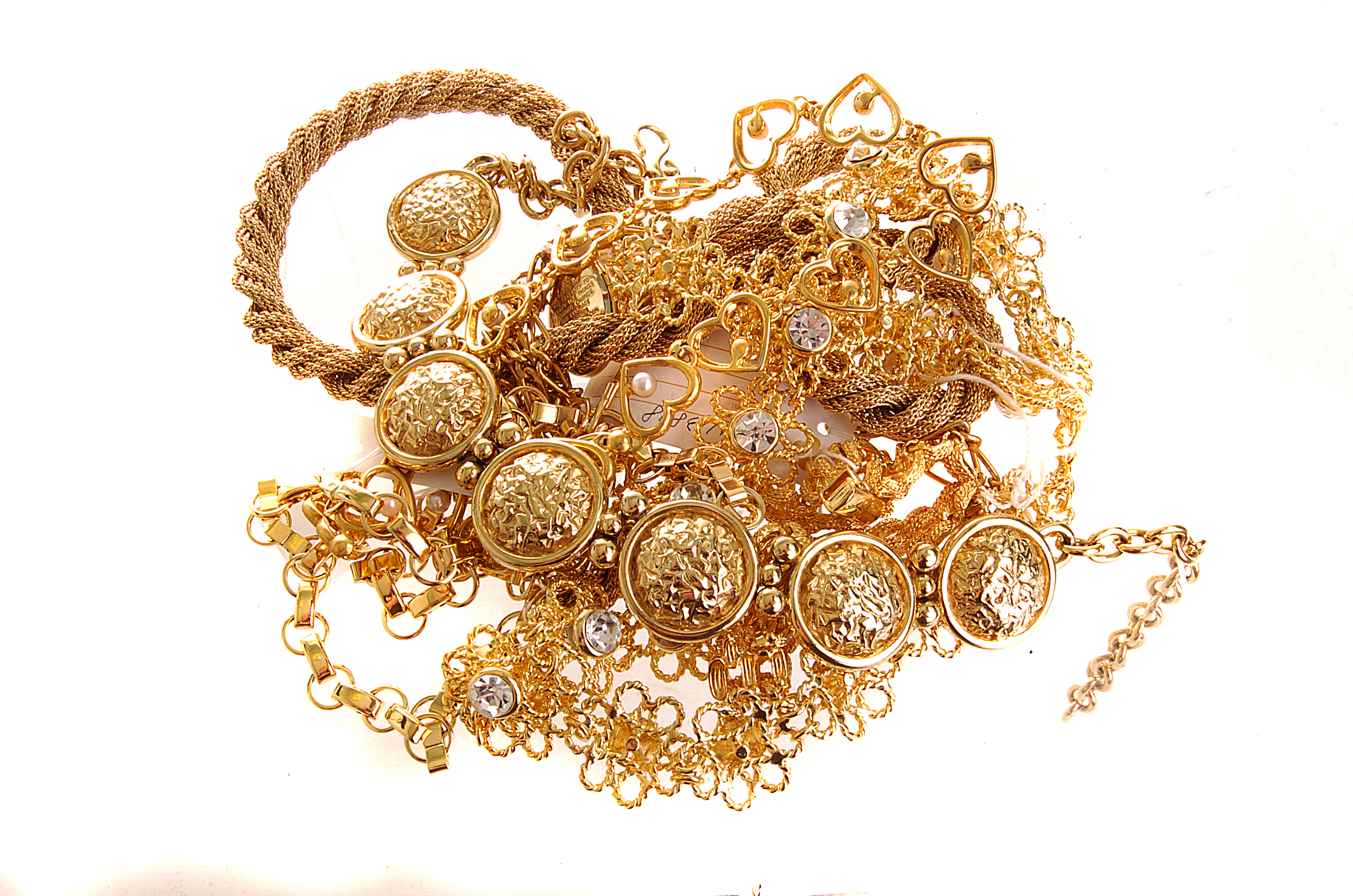 A collection of gilt metal costume jewellery, including seven necklaces, a bracelet and two pairs