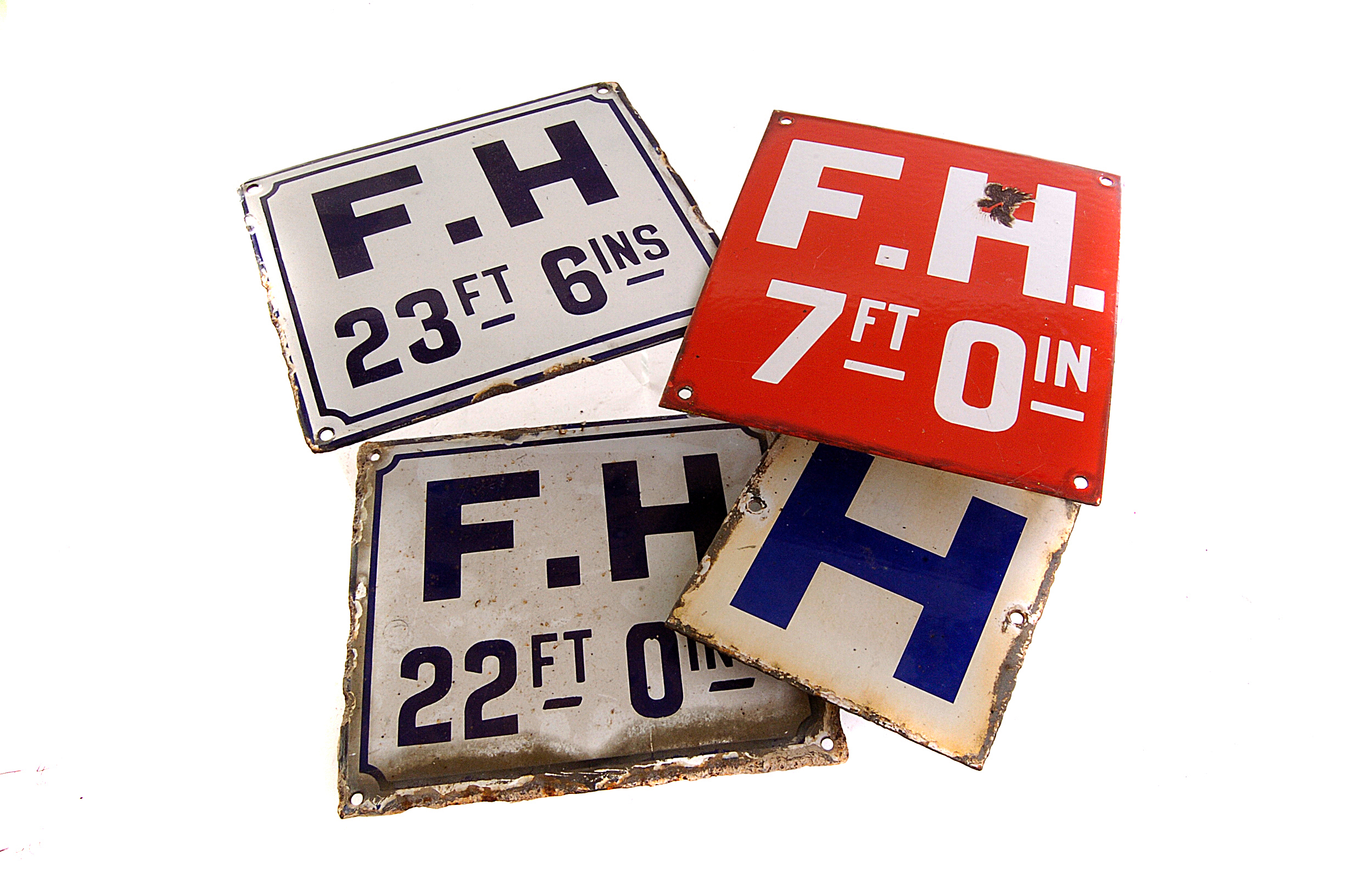 A large collection of fire hydrant signs, mainly small enamel signs, plus plastic, and metal