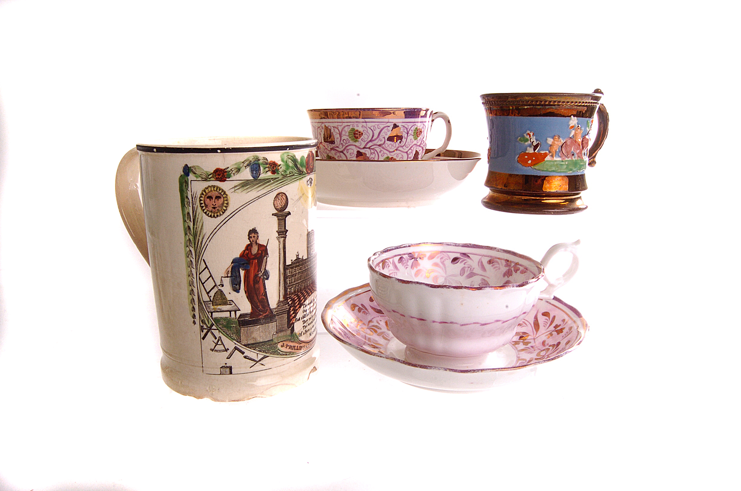A J.Pillips & Co Masonic tankard, together with two Lustre ware cups and saucers and a bronze