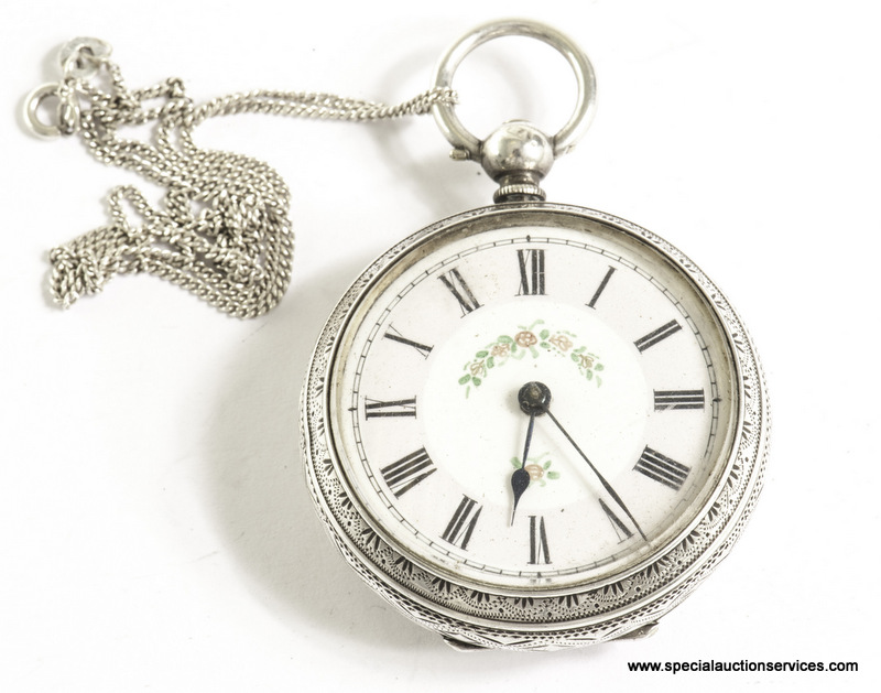 A silver lady`s pocket watch, marked Birmingham 1882, with white and pink enamel dial and floral